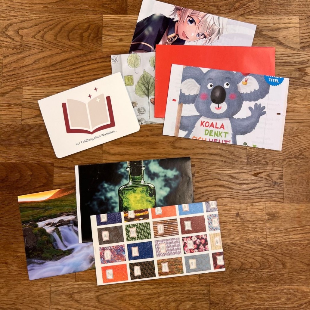 Beispielbild für nachhaltige Gutscheinhüllen und einen Gutschein, die in den Bücherträumen in Mülheim an der Ruhr erworben werden können