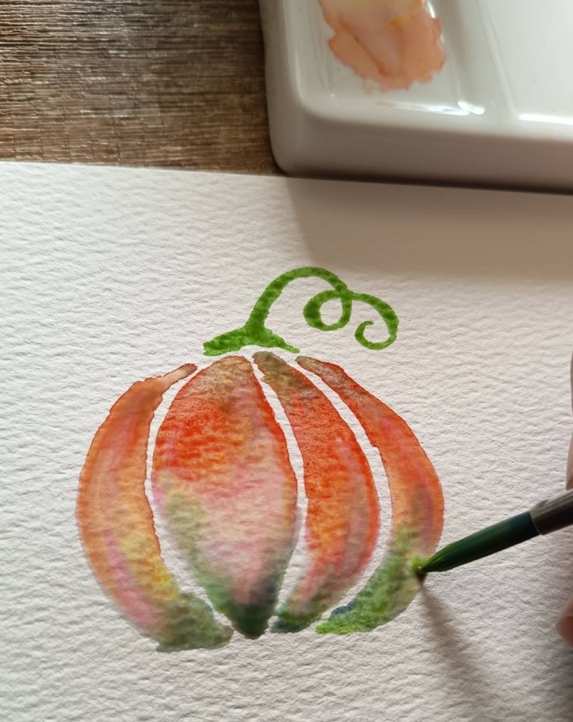 Beispielbild für den Workshop "Aquarell - Herbstzauber & Winterglanz" mit Laura aus dem Siepen von der Kreativagentur Farbtier in den Bücherträumen in Mülheim an der Ruhr. Hier wird ein Kürbis finalisiert.