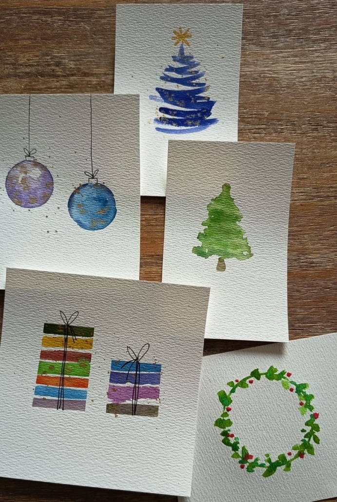 Beispielbild für den Workshop "Aquarell - Herbstzauber & Winterglanz" mit Laura aus dem Siepen von der Kreativagentur Farbtier in den Bücherträumen in Mülheim an der Ruhr. Hier sind verschiedene weihnachtliche Motive zu sehen.